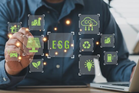 A man focused on his laptop, surrounded by eco-friendly icons representing sustainability and environmental awareness.