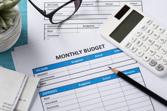 A detailed monthly budget plan for a small business, featuring income, expenses, and savings projections.